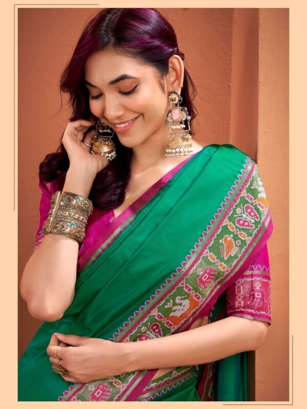 Emerald Green Patola Silk Saree with Pink Multicolor Designer Border