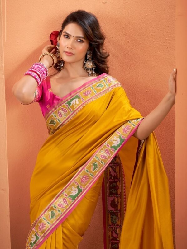 Mustard Yellow Patola Silk Saree with Pink Multicolor Designer Border