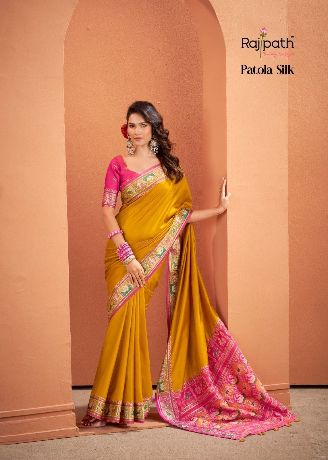 Mustard Yellow Patola Silk Saree with Pink Multicolor Designer Border - Image 2